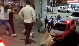 Tartıştığı kişiye polisin önünde bıçakla saldırdı