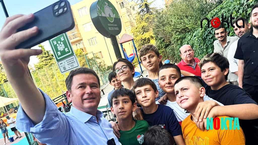 Başkan Aydın gençlerle basketbol sahası boyadı