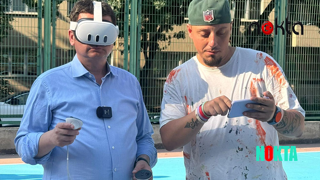 Başkan Aydın gençlerle basketbol sahası boyadı